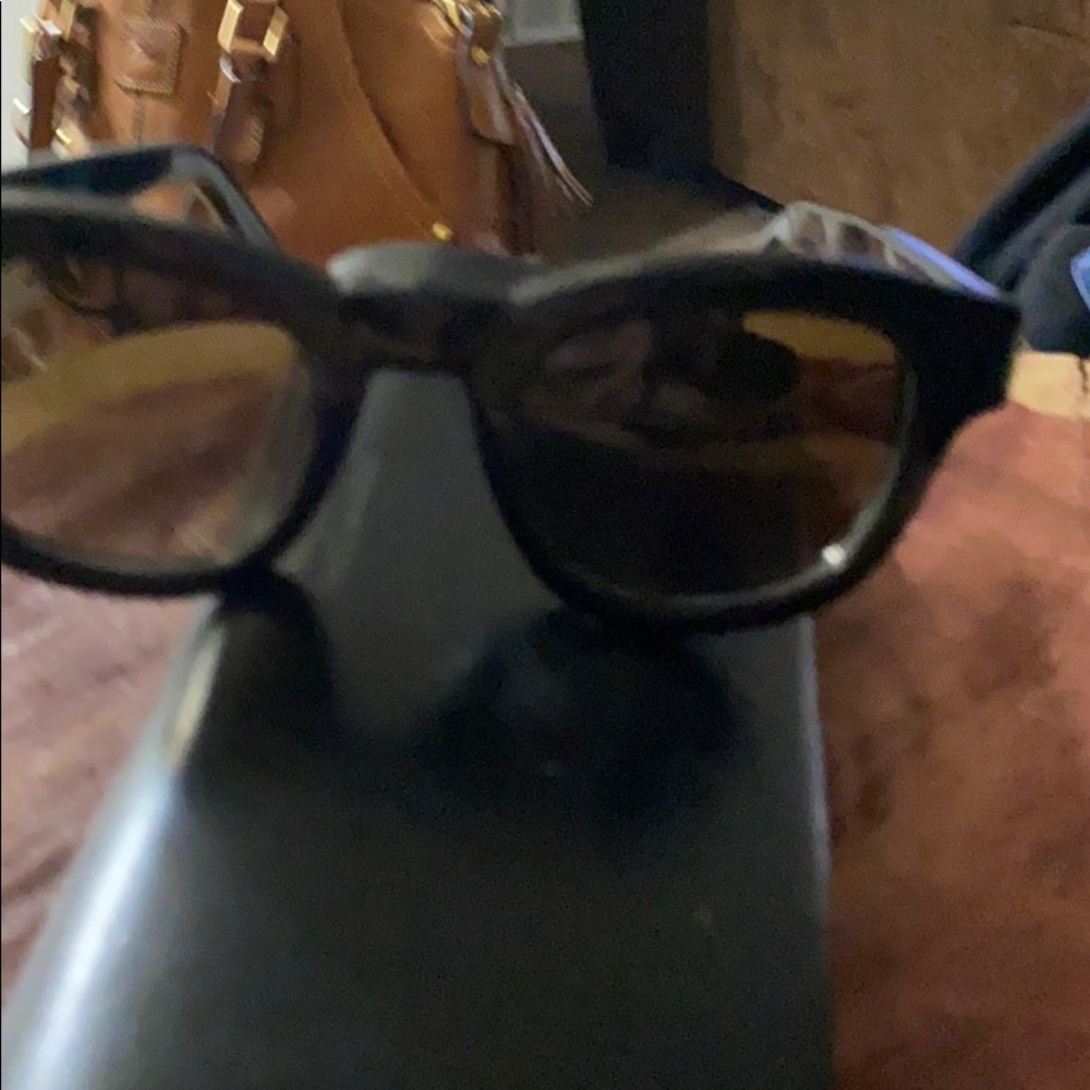 Bold black saint Laurent sunglasses